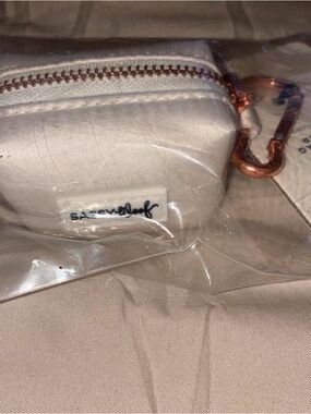 Small Cream doggie waste bag with Rose Gold Hardware